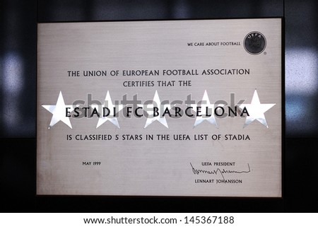 BARCELONA - JUNE 5: A plaque sitted on the F.C Barcelona Museum that certifies by the UEFA that Camp Nou stadium is classified with 5 stars on June 5, 2010 in Barcelona, Spain.