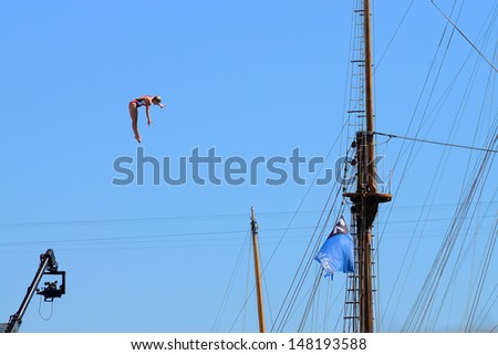 BARCELONA - JULY 30:Stephanie De Lima, jumps from the High Diving Tower at the final of women\'s high altitude jumps at Barcelona Swimming World Championship on July 30, 2013 in Barcelona, Spain.