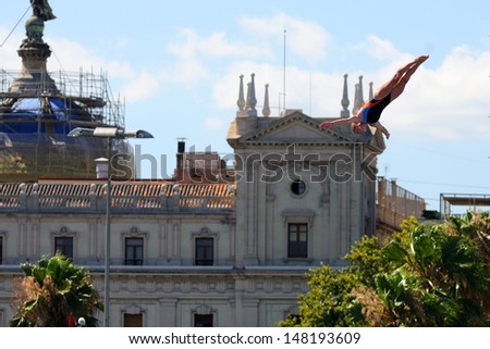 BARCELONA - JULY 30: Ginger Huber, jumps from the High Diving Tower at the final of women\'s high altitude jumps at Barcelona Swimming World Championship on July 30, 2013 in Barcelona, Spain.