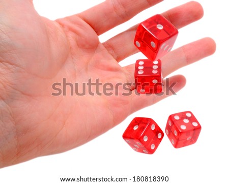 Human hand throwing dice, isolated on white background.