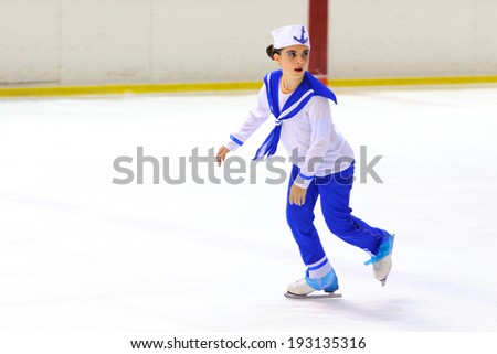 BARCELONA - MAY 03: Young team from a school of skating on ice performs, disguised as sailors, at the International Cup Ciutat de Barcelona Open on May 3, 2014 in Barcelona, Spain.