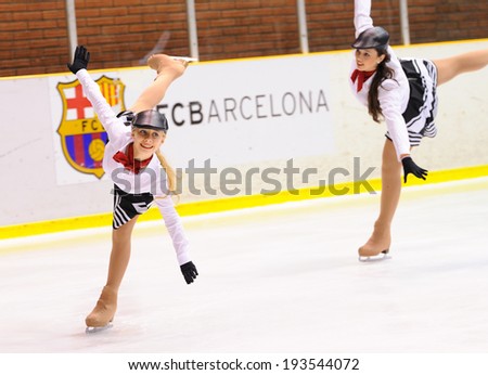BARCELONA - MAY 03: Young team from a school of skating on ice performs, disguised as artists painters, at the International Cup Ciutat de Barcelona Open on May 3, 2014 in Barcelona, Spain.