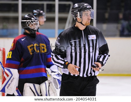 BARCELONA - MAY 11: The referee in action in the Ice Hockey final of the Copa del Rey (Spanish Cup) between F.C. Barcelona and Jabac Terrassa teams on May 11, 2014 in Barcelona, Spain.