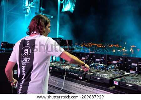 BENICASSIM, SPAIN - JULY 20: Alesso (Swedish Deejay and electronic dance music producer) performs at FIB Festival on July 20, 2014 in Benicassim, Spain.