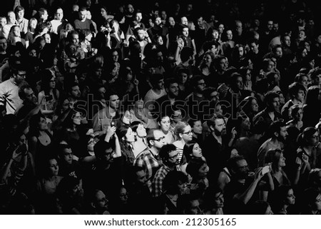 BARCELONA - FEB 15: Black and white picture of the crowd at Razzmatazz Clubs on February 15, 2014 in Barcelona, Spain.