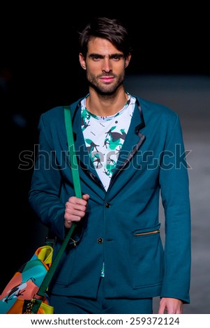 BARCELONA - FEB 4: Juan Betancourt (model) walks the runway for the Page collection at the 080 Barcelona Fashion Week 2015 Fall Winter on February 4, 2015 in Barcelona, Spain.