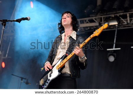 BENICASSIM, SPAIN - JULY 19: The bass player of Telegram (band) performance at FIB Festival on July 19, 2014 in Benicassim, Spain.