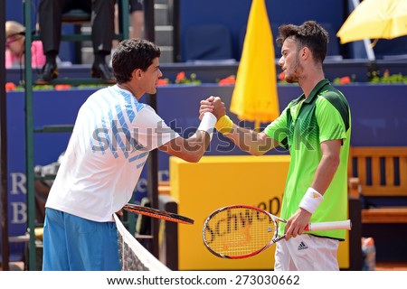 BARCELONA - APR 18: The players Rui Machado (left) and Javier Marti (right) shake hands after the match at the ATP Barcelona Open Banc Sabadell tournament on April 18, 2015 in Barcelona, Spain.