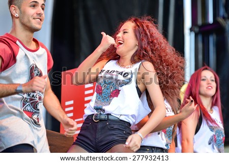 BARCELONA - MAY 23: People dance a choreography at the Primavera Pop Festival of Badalona on May 18, 2014 in Barcelona, Spain.