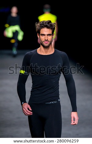 BARCELONA - FEB 5: Juan Betancourt (model) walks the runway for the Punto Blanco collection at the 080 Barcelona Fashion Week 2015 Fall Winter on February 5, 2015 in Barcelona, Spain.