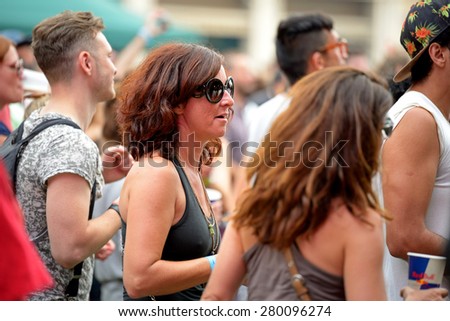BARCELONA - JUN 12: People dance at Sonar Festival on June 12, 2014 in Barcelona, Spain.