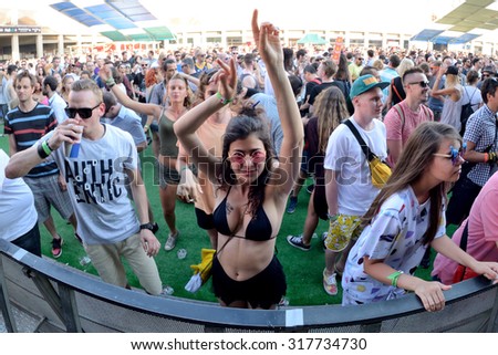 BARCELONA - JUN 18: People dance at Sonar Festival on June 18, 2015 in Barcelona, Spain.