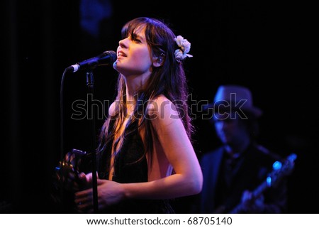 BARCELONA, SPAIN - APR 25: Zooey Deschanel, Hollywood Actress and singer, performs with her band She & Him at Apolo on April 25, 2010 in Barcelona, Spain. She performs with Matt Ward.