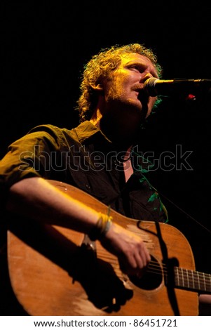 BARCELONA, SPAIN - OCT 6: Glen Hansard, singer of The Swell Season and lead actor of the film Once, performs at C.A.T. (Centre Artesa Tradicionarius) on October 6, 2011 in Barcelona, Spain.