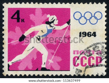 RUSSIA - CIRCA 1964: stamp printed by Russia, shows sport, skier, skiing, snowflake, winter circa 1964