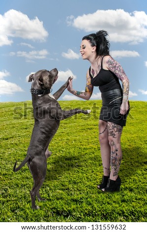 Beautiful Woman and a Pit Bull