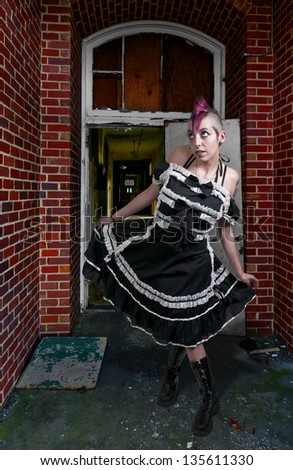 Beautiful young punk rock alternative lifestyle woman