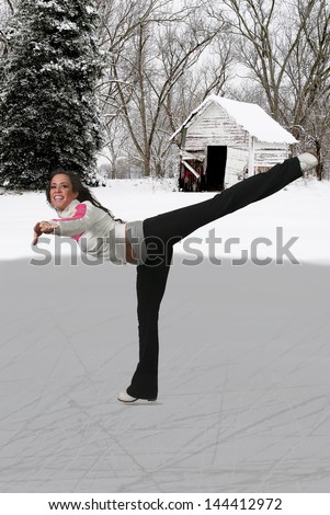 Beautiful young woman figure skater on ice skates