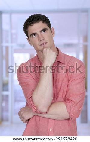 Handsome man thinking thoughts with his brain