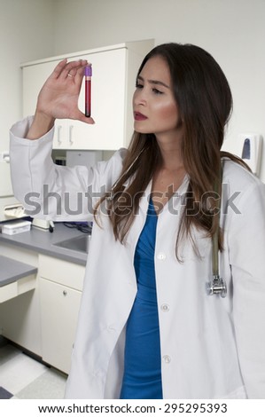 Nurse taking a patient\'s blood sample in a medical facility