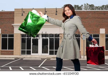 A beautiful young woman on a Christmas shopping spree