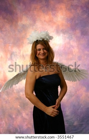 Lovely angel with wings and halo