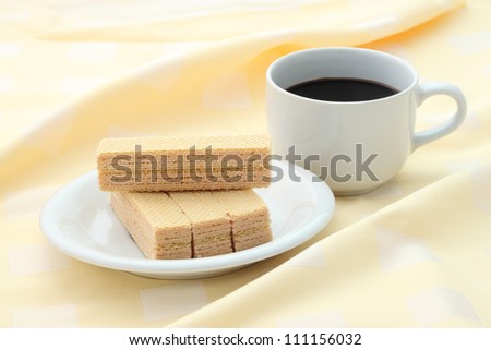 Breaking time meal focus on top wafer.