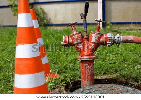 Similar – Image, Stock Photo two hydrants on old dirty wall of a house with closed blinds