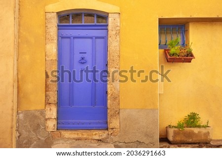 Lavender door and yellow facade of the house. Old architecture in Valensole, Provence, France.  Stok fotoğraf © 
