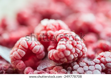 Frozen raspberry berries. Macro image with small depth of sharpness