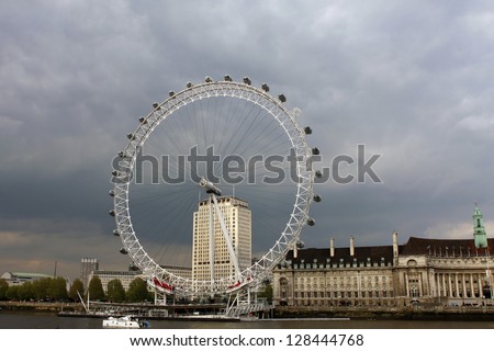 LONDON-MAY 13:View of The London Eye on May 13, 2010 in London, England.A famous tourist attraction at a height of 135 meters (443 ft) and the biggest Ferris wheel in Europe