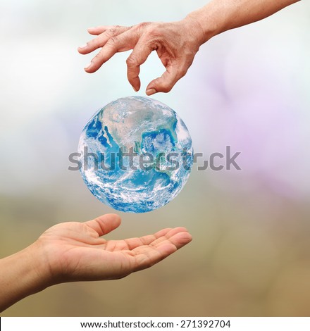 Man woman hands palm up with global image over white Elements of this image furnished by NASA