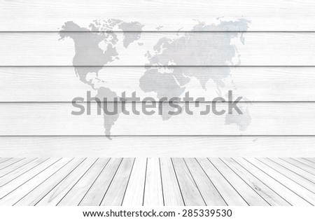 White bleached brick wall and perspective small wood strip with continents map