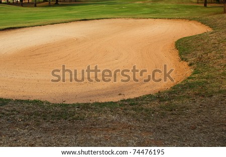 Sand trap on the golf course.
