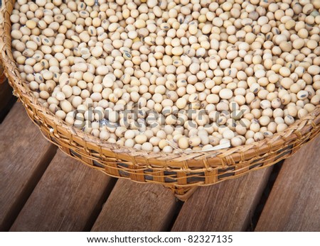 soy bean in bamboo dish on wood background