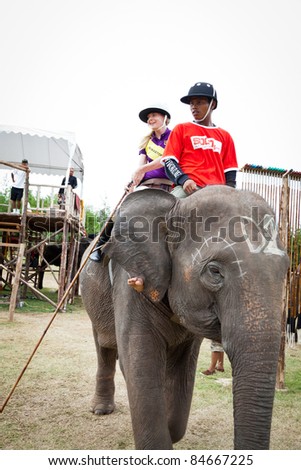 HUA HIN, THAILAND -SEPTEMBER 8: Sara Story from Sara Story Design Team in elephant polo games the 2011 King \'s Cup Elephant Polo match on September 8, 2011 at Suriyothai Camp in Hua Hin, Thailand.