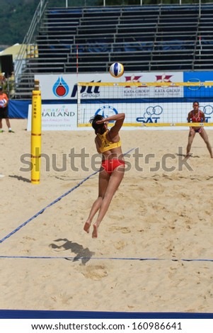 PHUKET, THAILAND - OCTOBER 30: unidentified thailand and china players during day 2 of the FIVB Beach Volleyball, Phuket Thailand Open on October 30,  2013 at Karon Beach in Phuket, Thailand