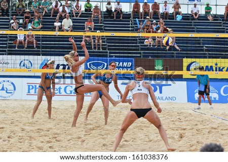 PHUKET, THAILAND - OCTOBER 31: unidentified russia and greece  players during day 3 of the FIVB Beach Volleyball, Phuket Thailand Open on October 30,  2013 at Karon Beach in Phuket,Thailand