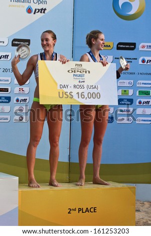 PHUKET, THAILAND - NOVEMBER 3: Emily Day and Summer Ross of America  celebrate silver medal win at the SWATCH FIVB World Tour 2013 on November 3, 2013 at Karon Beach in Phuket, Thailand