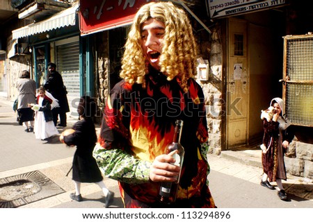 JERUSALEM - MARCH 15: Ultra-orthodox Jewish man dressed as a woman on the Jewish holiday Purim on March 15 2006 in Mea Shearim in Jerusalem, Israel.