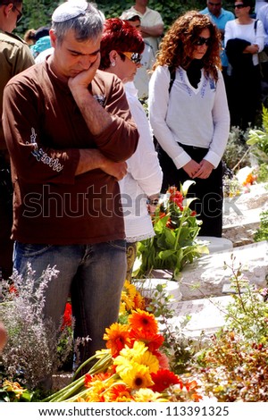 JERUSALEM - APRIL 23:Relatives of fallen soldiers at the ceremony to mark Memorial Day or Yom Hazikaron at the Memorial Service for Victims of Terror on Mount Herzl in Jerusalem April 23, 2007