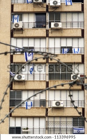 ASHKELON - APRIL 28:Israeli building decorated with the Israeli national flags during the Israeli national holiday of Independence Day on April 28 2006 in Ashkelon,Israel.