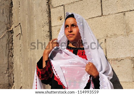 WESTERN NEGEV - NOVEMBER 26:Bedouin woman  traditionally dressed on November 26 2008. The nomadic Arabs live by rearing livestock in the deserts of southern Israel.