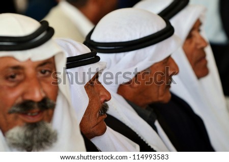 WESTERN NEGEV-DECEMBER 13:An Arab Bedouin men wears traditional kufeyas in southern Israel on December 13 2011.The nomadic Arabs live by rearing livestock in the deserts of southern Israel.