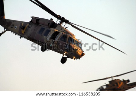 BEERSHEBA-JUNE 28:Sikorsky UH-60 Black Hawk helicopter fly above Hatzerim Air Force base near Beersheba, Israel on June 28, 2007.It have served in combat during conflicts all over the world since 1979