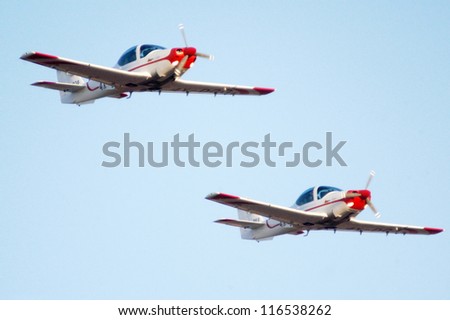 BEERSHEBA-JUNE 28: Two G120A training planes fly above Hatzerim Air Force base near Beersheba, Israel on June 28, 2007. Its specially designed for military and civil pilots training.