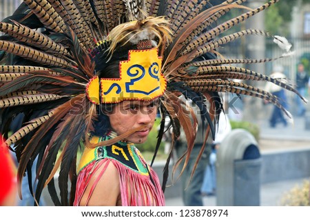 MEXICO CITY-FEB 23:Portrait of Male Aztec Indian wearing traditional clothing and headdressat the Zocalo Square on February 23 2010 in Mexico City.Since 1982 the Zocalo become cultural events center