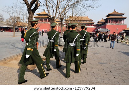 BEIJING - MARCH 11:Chinese soldiers march in the Forbidden City on March 11 2009 in Beijing,China.The Forbidden City was the Chinese imperial palace since the Ming Dynasty.