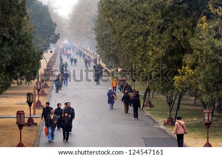 BEIJING-MARCH 15:Chinese people visit at the Temple of Heaven park on Mar 15 2009 in Beijing, China.In 1918 the temple was turned into a park and for the first time open to the public