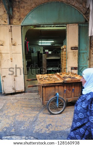 JERUSALEM - NOV 05: Muslim Arab woman at Jerusalem old city market on November 05 2010.Jerusalem is a holy city to the three major Abrahamic religions - ?Judaism, Christianity and Islam.